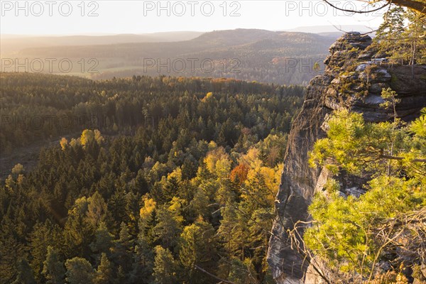 Rocks and autumnal mixed forest on the Pfaffenstein