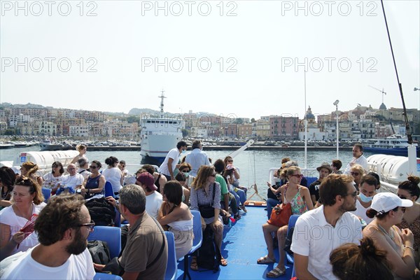 Tourists on the ferry to Procida