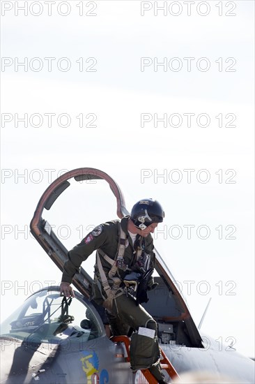 Polish pilot leaving the cockpit of a Mikoyan-Gurevich MIG-29 Fulcrum