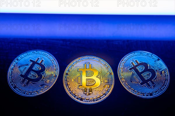 Bitcoins are golden coins and a new cryptocurrency