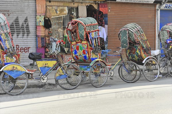 Rickshaws waiting for passengers