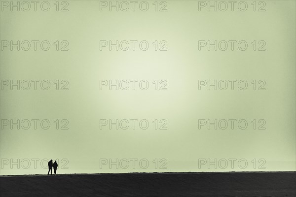 Walkers on the North Sea coast