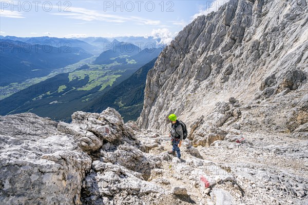 Mountaineer looking into the Inn valley