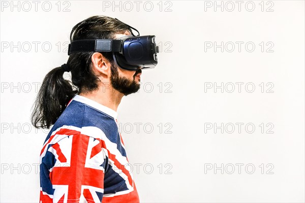 Man on white background with Virtual Reality headsets on