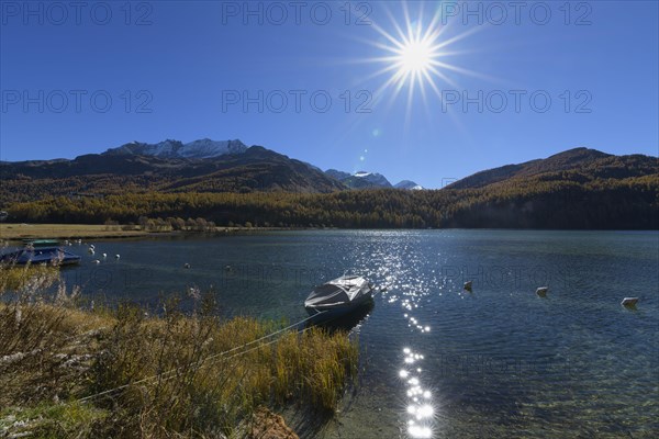 Lake with sun in autumn