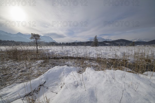 Lake Barmsee with Karwendel mountainrange on morning in winter