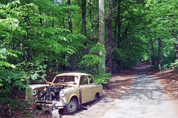 Scrap Trabi parked in the forest near Binz