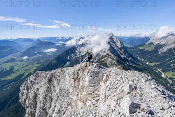 Mountaineer on ridge of Mieminger Kette