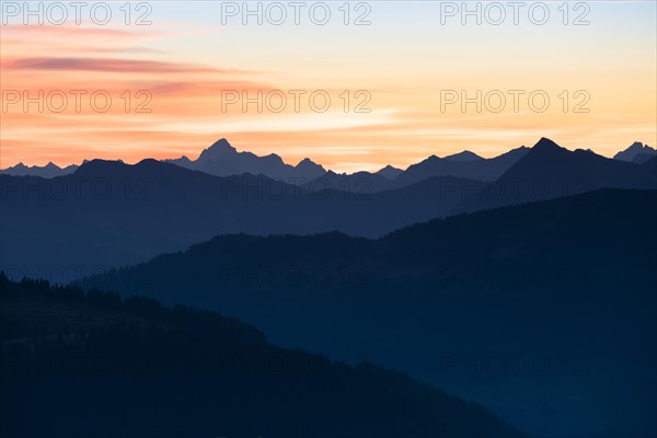 Mountain panorama in front of sunrise from Portlakopf