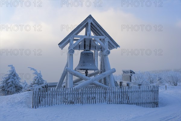 Peace bell on the summit of Fichtelberg with snow in winter