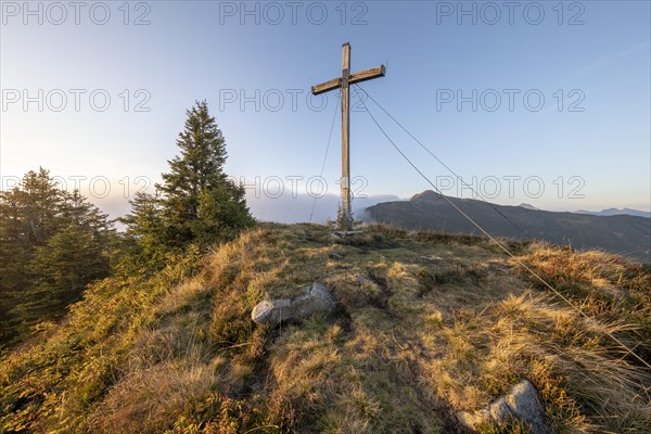 Summit cross in the morning light on Portlakopf