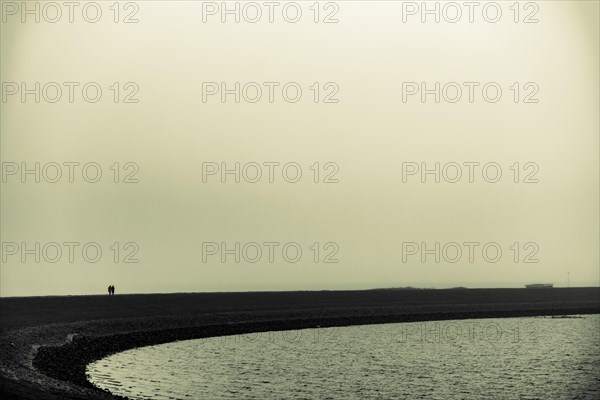 Walkers on the North Sea coast