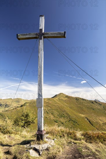 Summit cross in the morning light on Portlakopf