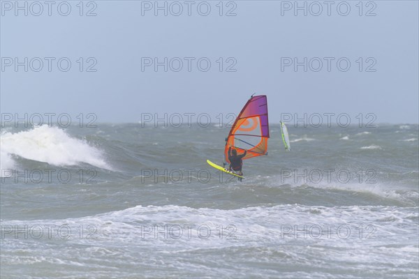 Breaking Wave with surfer