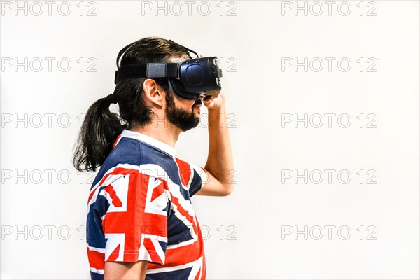 Man on white background with Virtual Reality headsets on