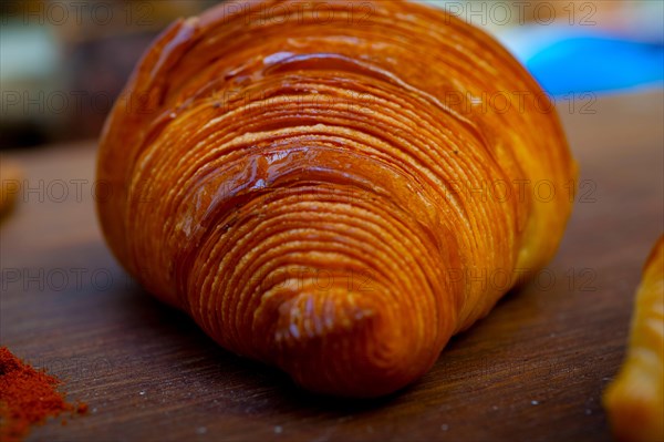 French traditiona croissant brioche butter bread on wood