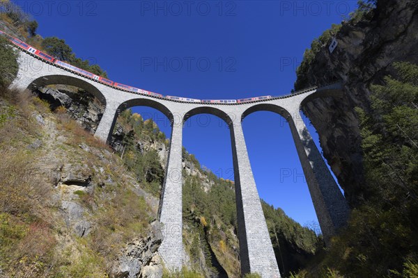 Railway viaduct with train