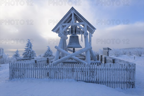 Peace bell on the summit of Fichtelberg with snow in winter