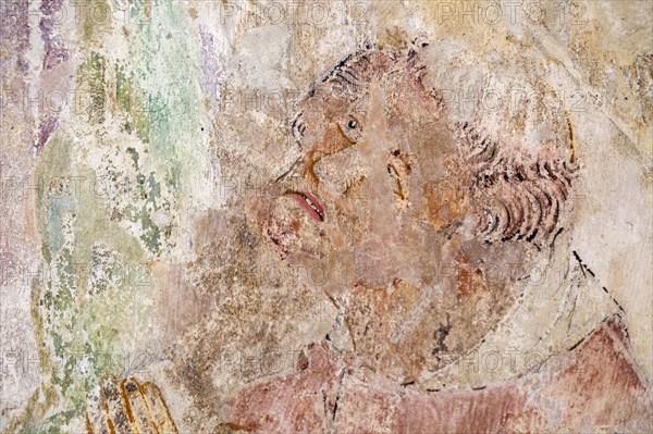 Early 14th century wall painting detail of priest or monk