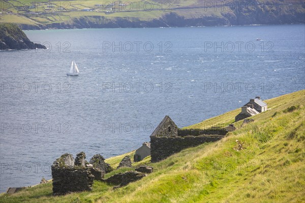 View of Blasket Sound and mainland from above ruined houses on Great Blasket Island. County Kerry