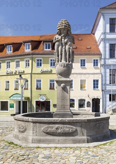 Evabrunnen or Paradise Fountain on the market square in Bischofswerda