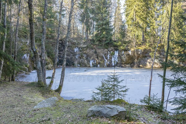 Frozen lake in an old quarry