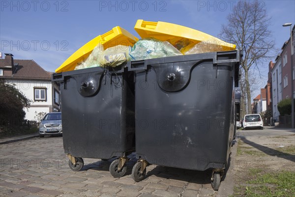 Yellow bin for plastic waste