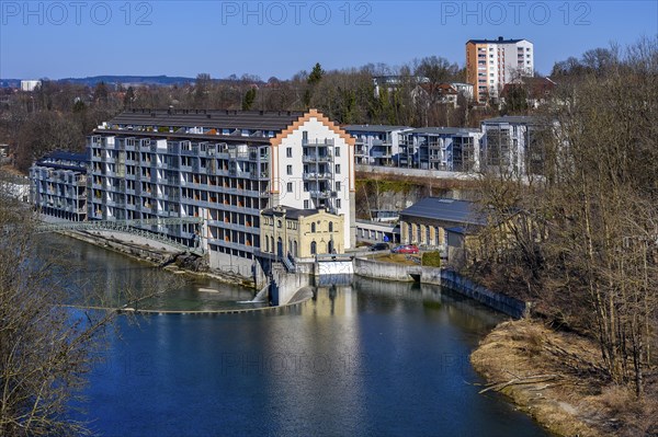 Old renovated spinning mill and new buildings on the Iller