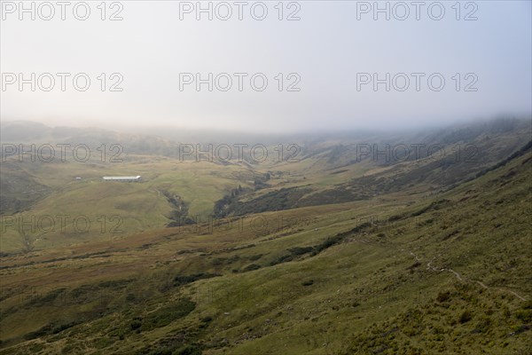 Fog in the high valley on an autumn evening at Potlakopf