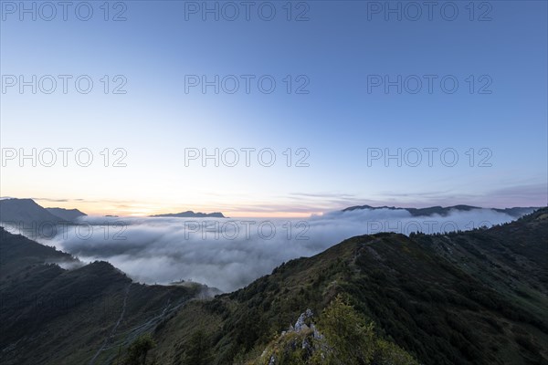 Fog in the high valley on an autumn evening at Potlakopf