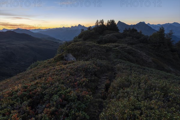 Mountain panorama in front of sunrise from Portlakopf