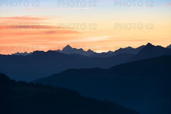 Mountain panorama in front of sunrise from Portlakopf