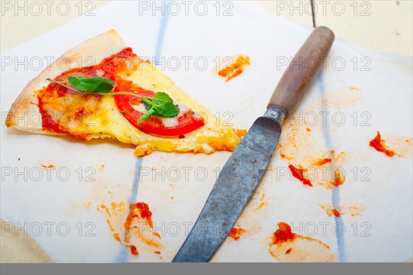 Italian traditional pizza Margherita tomato mozzarella and basil