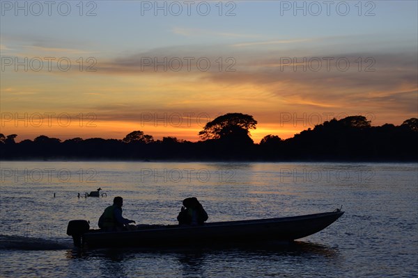 Tourist boat on the Rio Sao Lourenco at sunrise