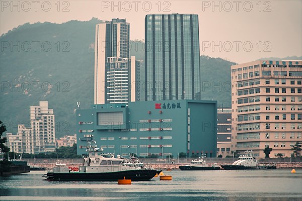 Ships and buildings in the sea in Macau