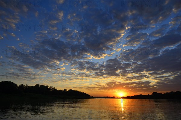 Sunrise with clouds over the Rio Sao Lourenco