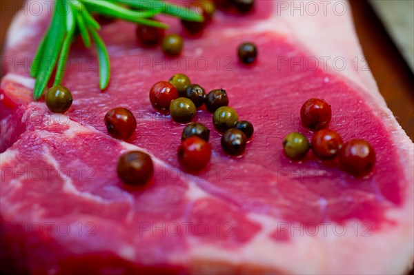 Raw uncooked ribeye beef steak butcher selection