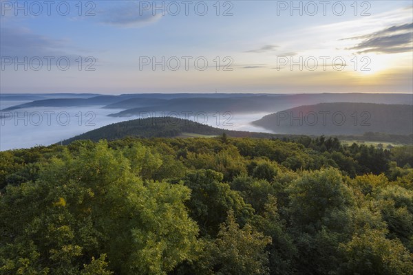 View from Katzenbuckel mountain with morning mist