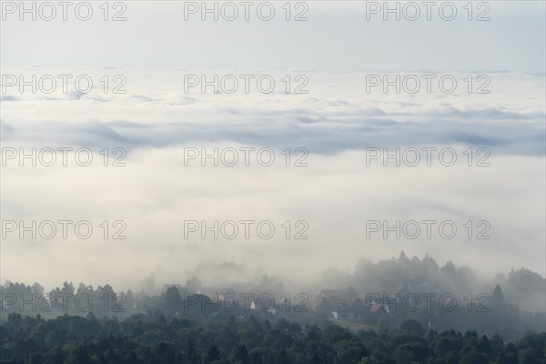 View from Katzenbuckel mountain with morning mist