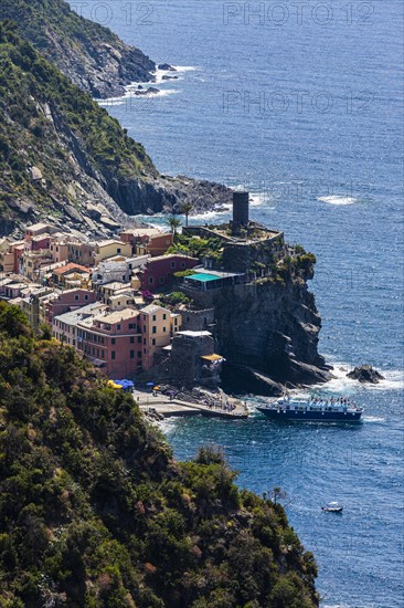 The village of Vernazza with its pastel-coloured houses built into the hillside