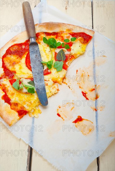 Italian traditional pizza Margherita tomato mozzarella and basil