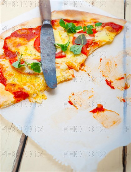 Italian traditional pizza Margherita tomato mozzarella and basil