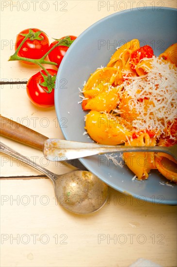 Italian snail lumaconi pasta with ripe cherry tomatoes sauce ingredients