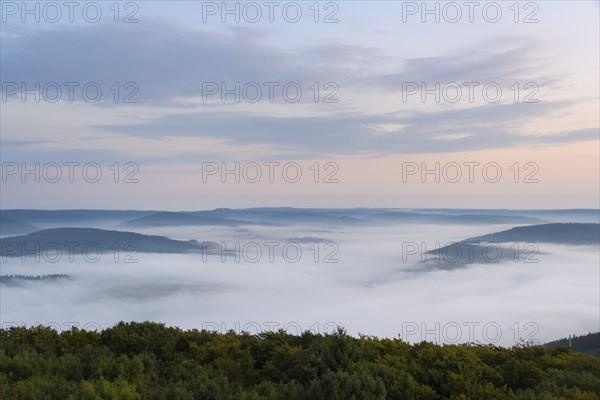 View from Katzenbuckel mountain with morning mist