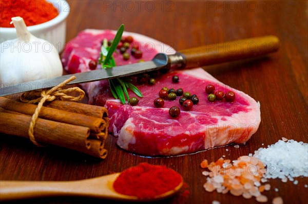 Raw uncooked ribeye beef steak butcher selection