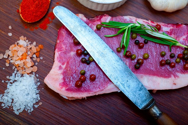 Raw uncooked ribeye beef steak butcher selection