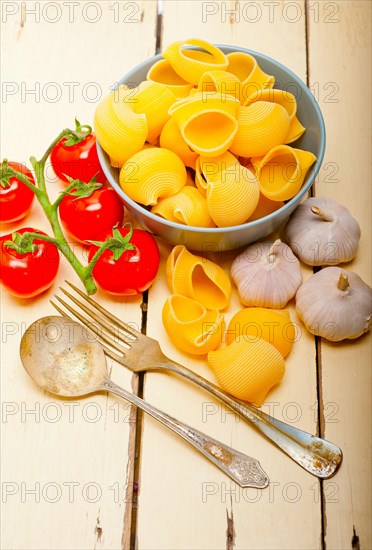 Italian snail lumaconi pasta with ripe cherry tomatoes sauce ingredients