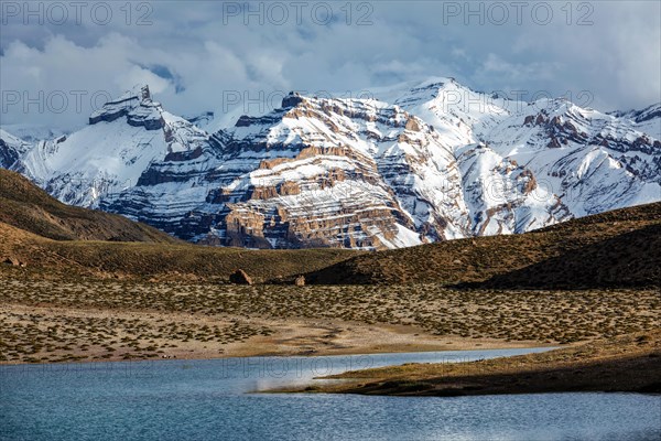 Himalayas mountains and mountain lake Dhankar Lake. Spiti Valley