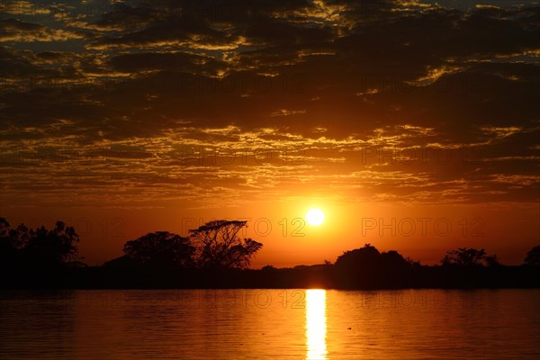 Sunrise with clouds over the Rio Sao Lourenco