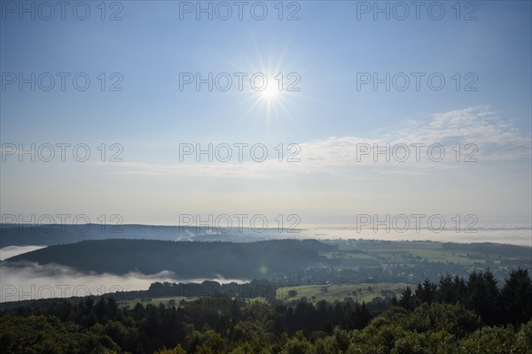 View from Katzenbuckel mountain with morning sun